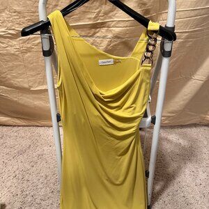 Yellow/Lemon color midi dress with one shoulder and gold chain details in strap